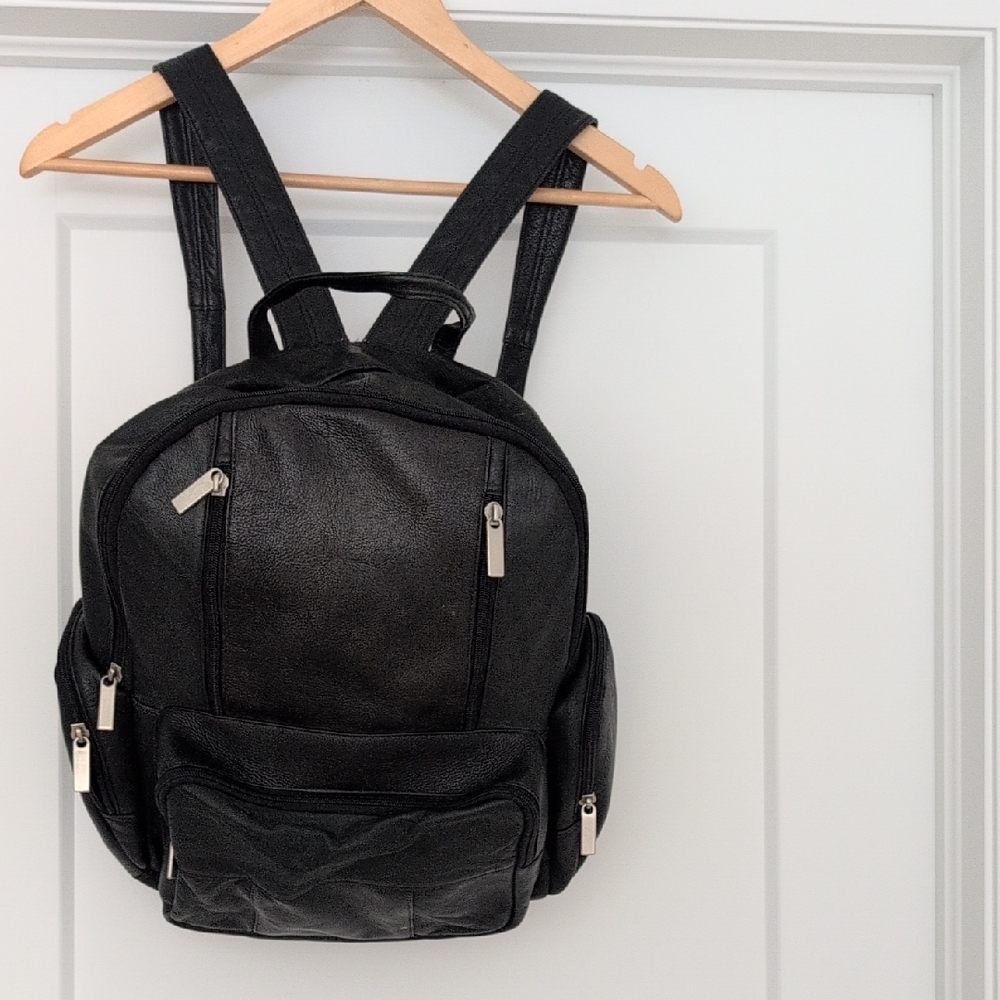 Sleek Black Leather Unisex Backpack.Made In Columbia